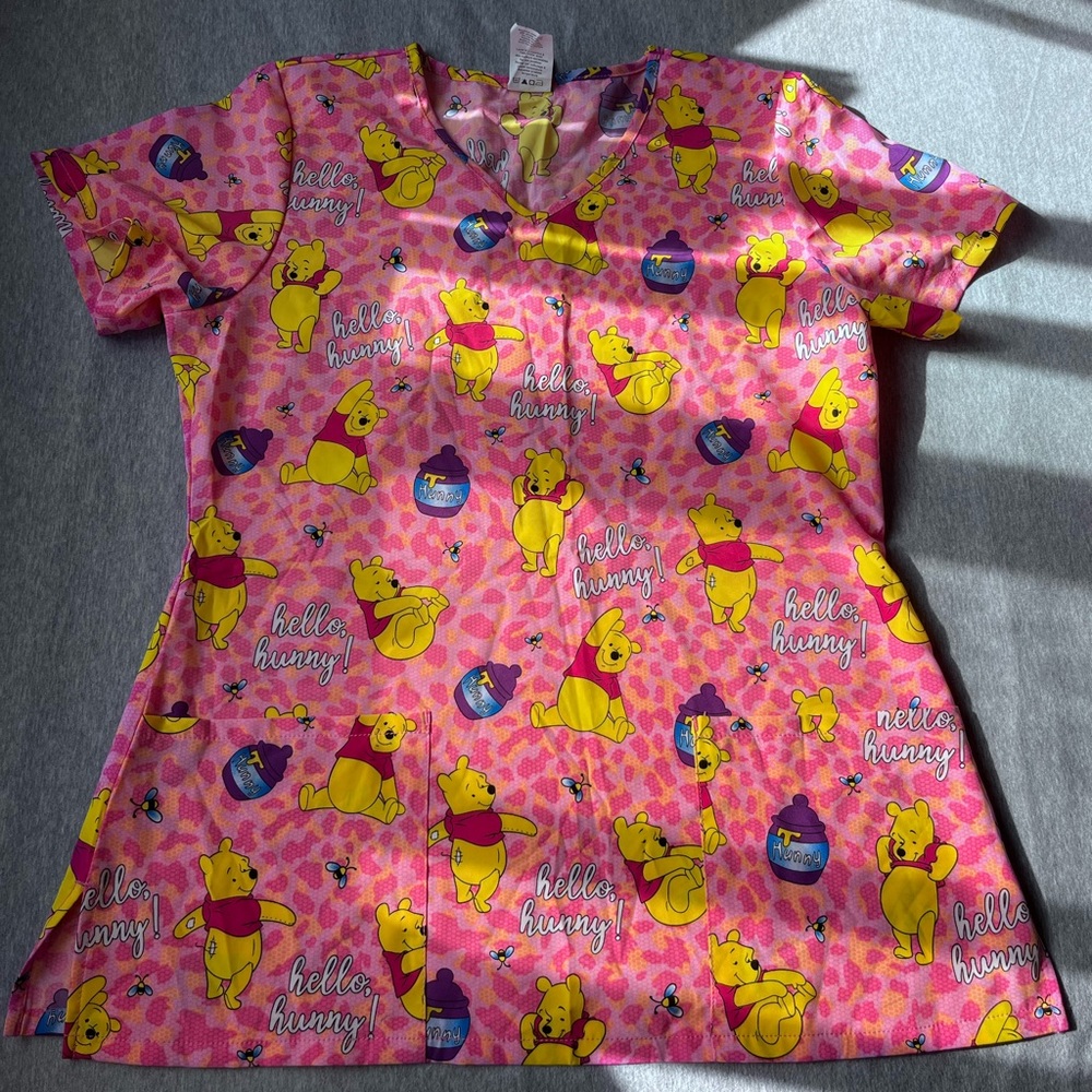 S/XS Winnie the Pooh pink scrub top never worn brand new